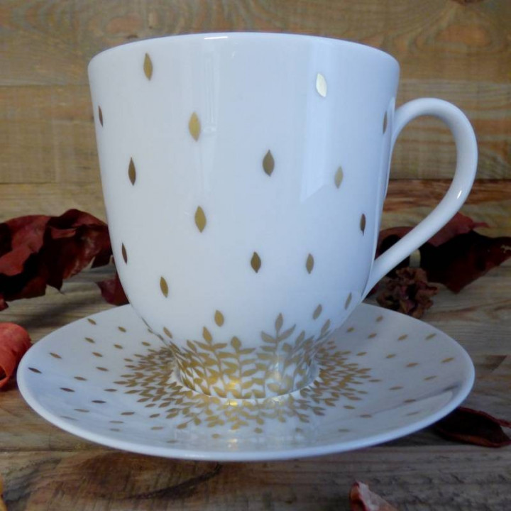 Large mug and under plate porcelain mug decorated with gold leaves