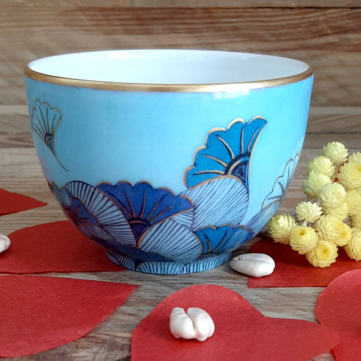 Tea cup porcelain without handle decorated with blue and gold  flowers