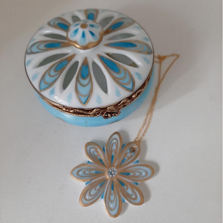 Porcelain jewelry box with blue and gold flower necklace -